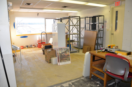 Central archives area with carpet and shelving removed; almost ready for some paint on the walls.